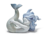 SCULTURA GIOCANDO CON IL MARE LLADRO'