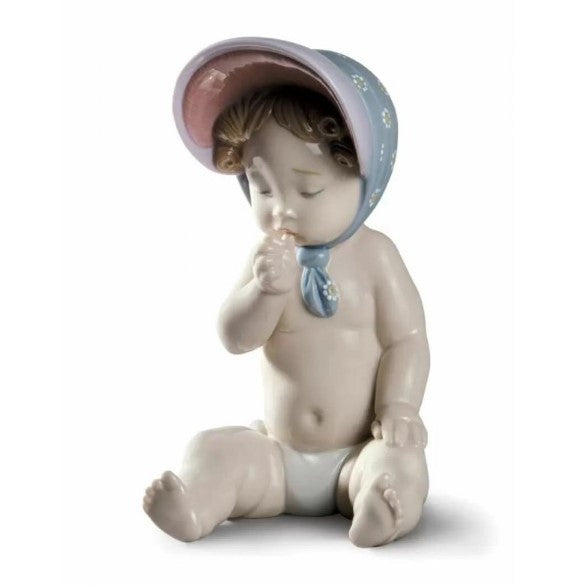 SCULTURA BIMBA CON BERRETTO LLADRO'