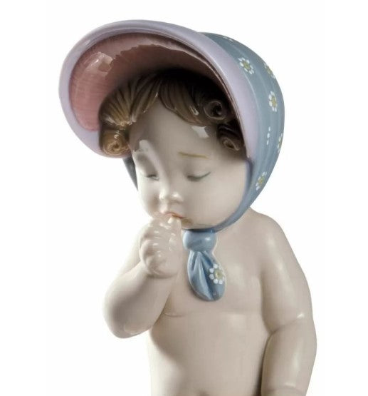 SCULTURA BIMBA CON BERRETTO LLADRO'